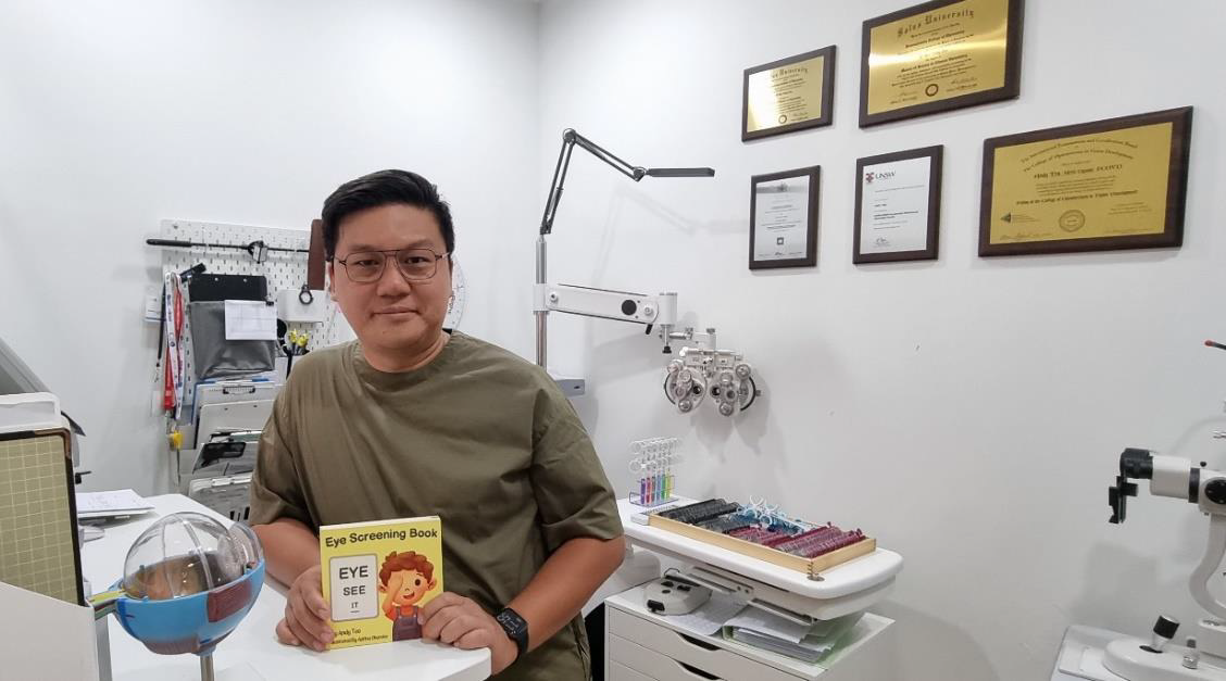Andy Teo with “The Children Eye Screening Book for Teachers & Parents”