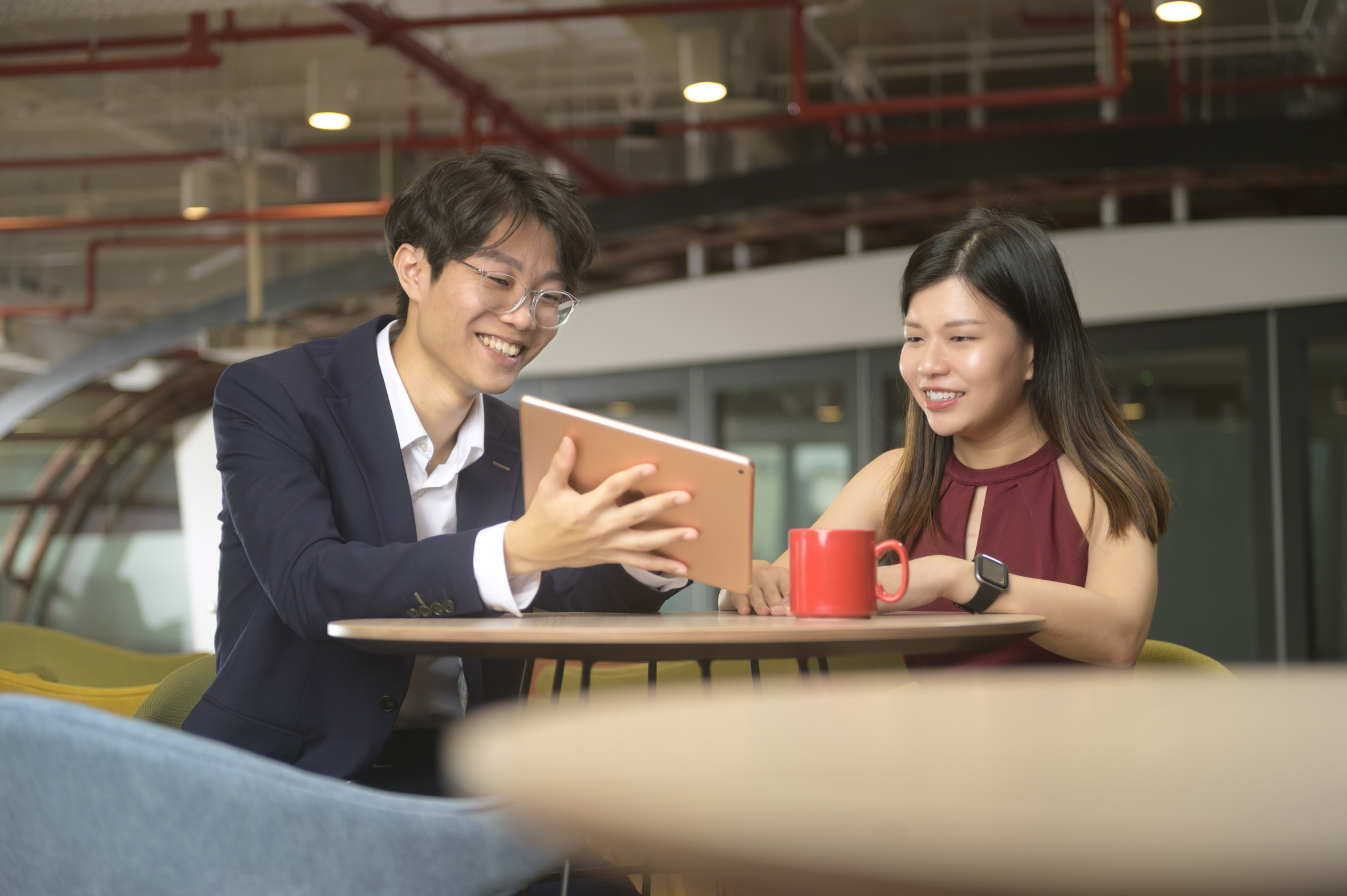 Financial representatives in Prudential’s 2024 Management Associate Programme cohort - (from left) Mr Tang Jia Hao, 25, a Wealth Manager with Prudential Financial Advisers (PFA) and Ms Charmaine Siow, 30, a Financial Consultant with Prudential Singapore.