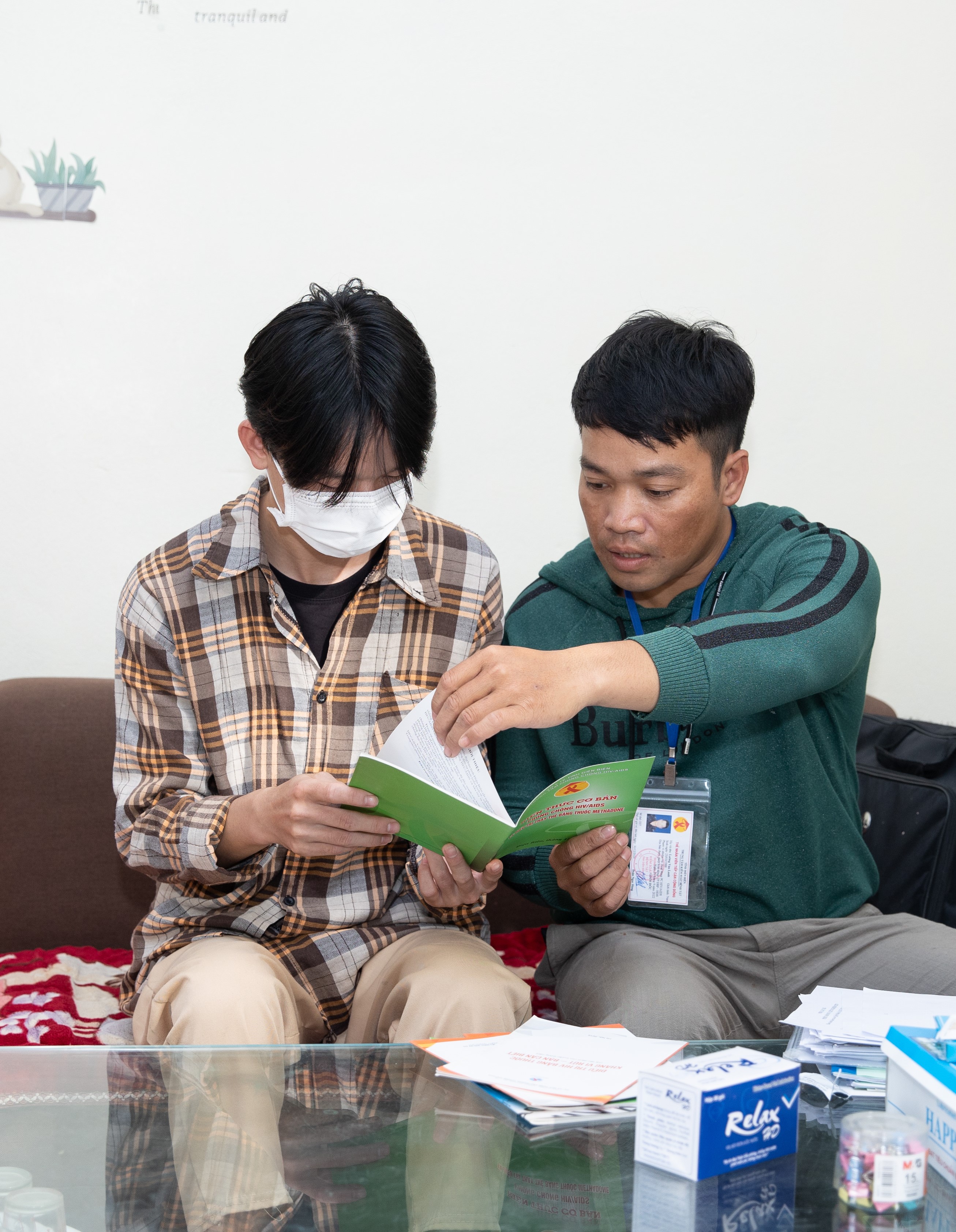 Community worker providing counseling on the use of condoms and lubricant for harm reduction in Dien Bien province, Viet Nam on 24 October 2022 Credit: VAAC (Vietnam Administration of HIV/AIDS Control)/UNAIDS/LHSS (Local Health System Sustainability Project)