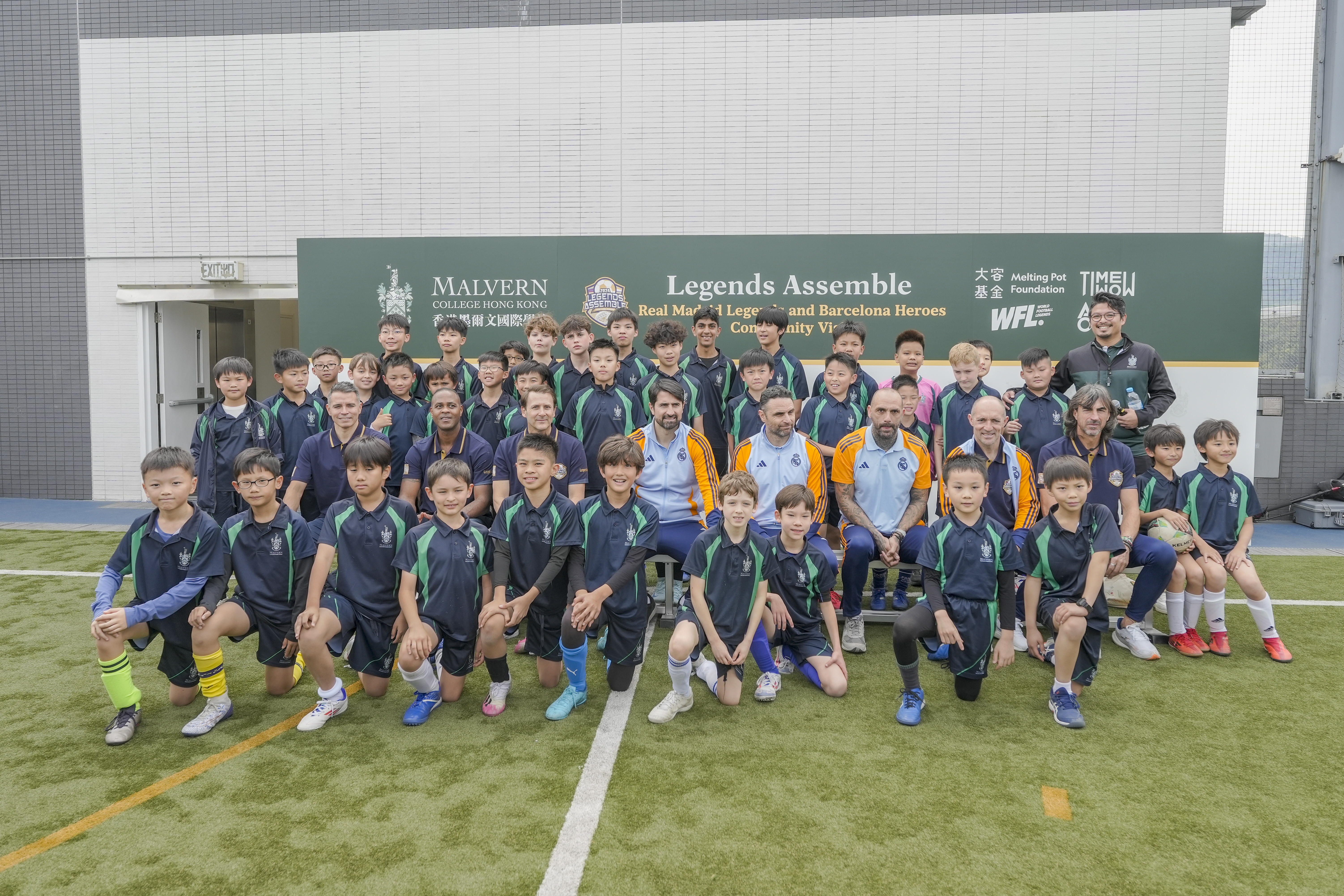 Legends unite L-R: Javier Saviola, Patrick Kluivert, Gaizka Mendieta, Ruben de la Red Gutierrez, Antonia Nunez Tena, Pedro Munitis Alvarez, Jose Emilio Amavisca Garate, and Raul Bravo Sanfelix, alongside Malvern College Hong Kong pupils.