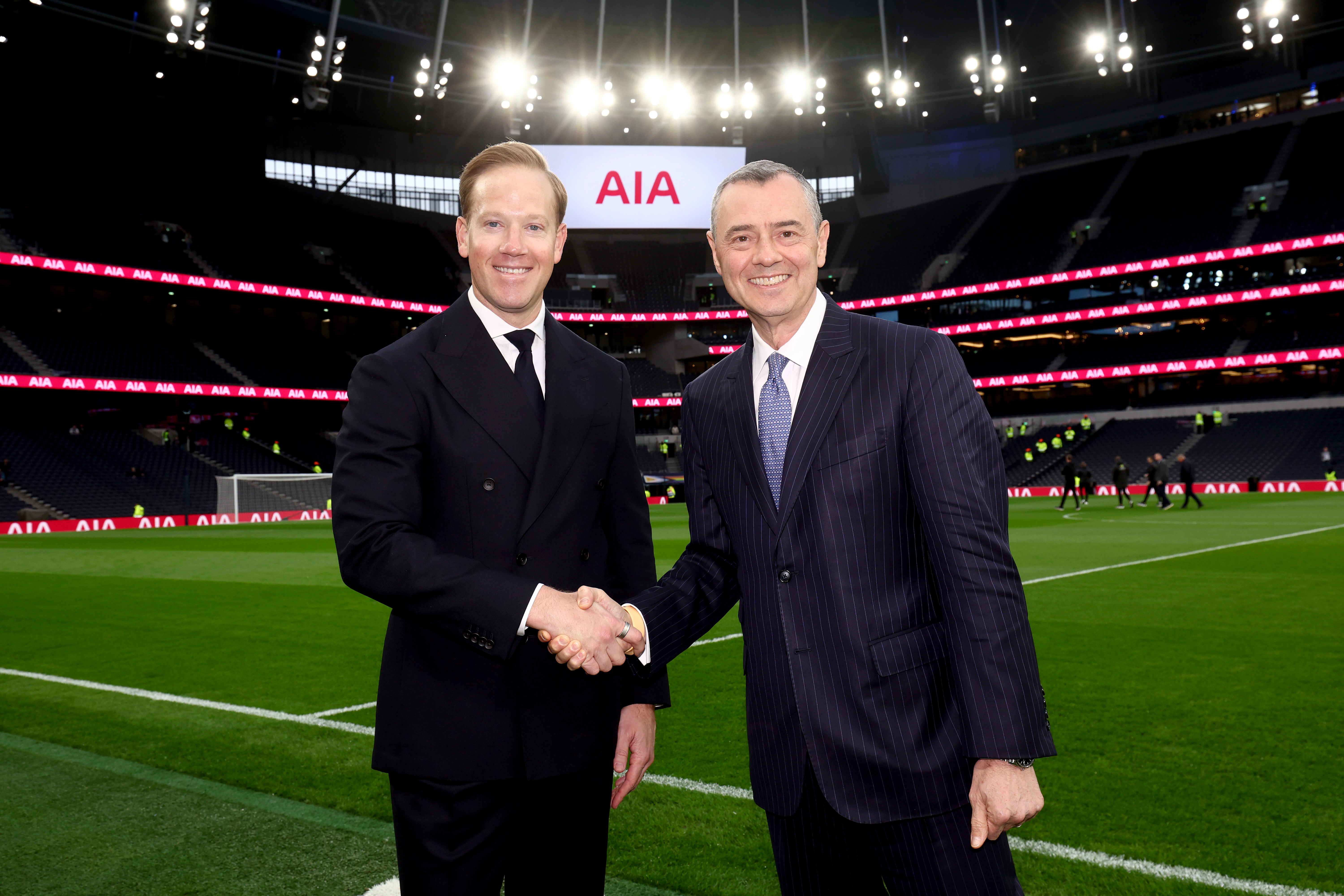 Ryan Norys, Chief Revenue Officer, Tottenham Hotspur, and Stuart A. Spencer, AIA Group Chief Marketing Officer, marking a new chapter in the partnership.