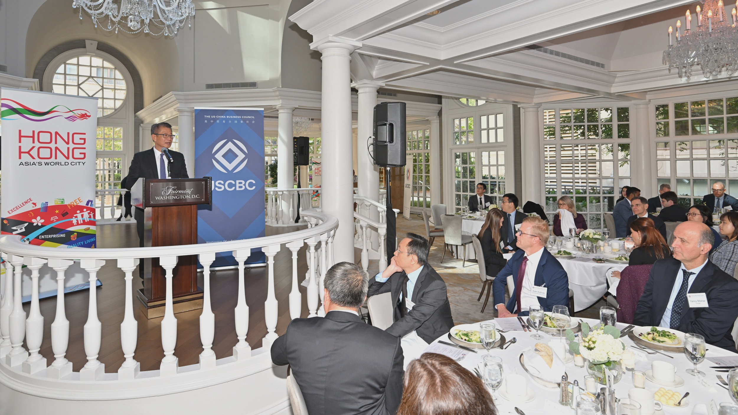 Mr Chan (first left) at a business luncheon at Washington, DC, reaffirms that Hong Kong will continue to welcome American businesses and talent to invest and develop their careers in the city