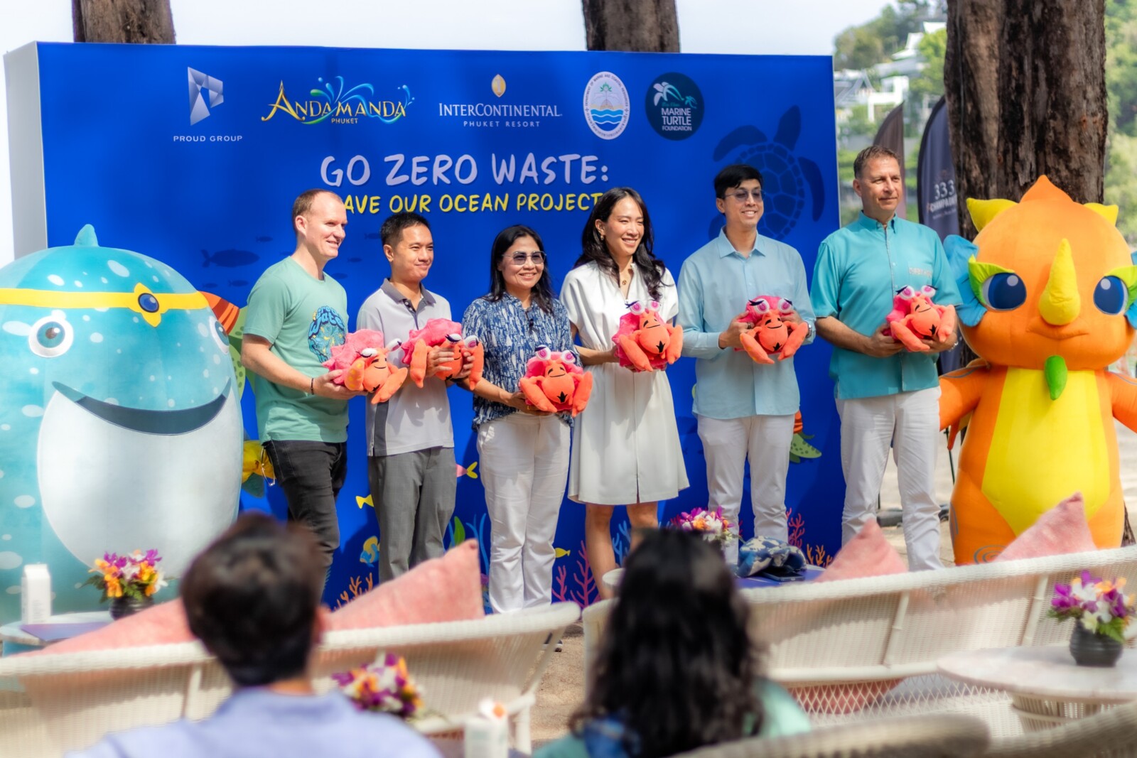 The executive team, under the leadership of Khun Proudputh Liptapanlop, gathered for a photo prior to the start of the sea turtle release.